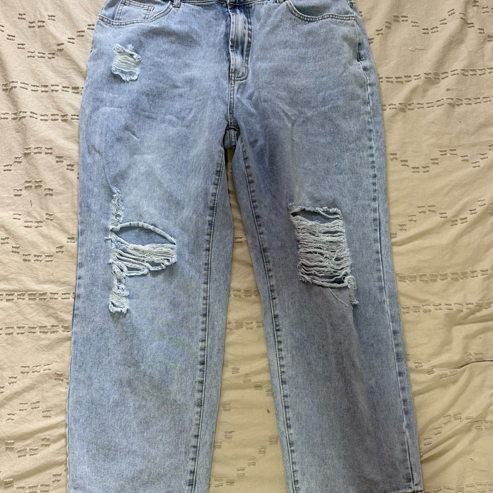Distressed Light Blue Jeans